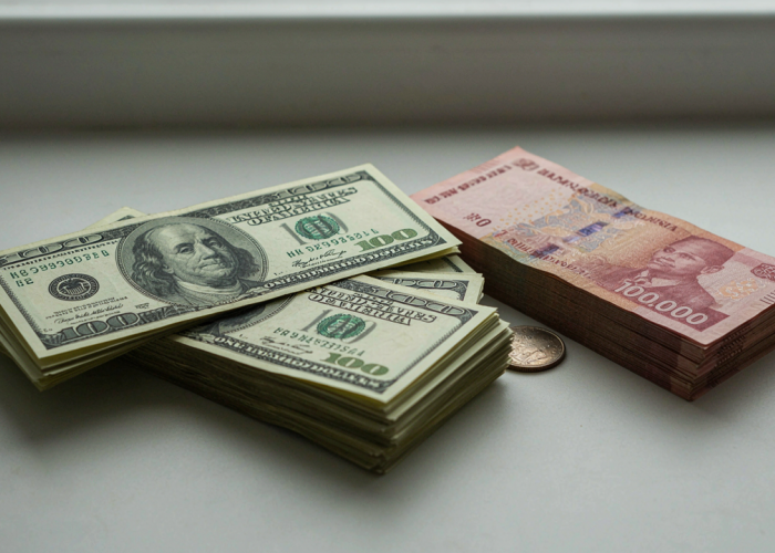 Rupiah Berpotensi Tertekan, Pasar Menunggu Keputusan Suku Bunga BI