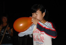 Kenapa Rahang Terasa Sakit Setelah Meniup Balon? Ini Penjelasannya