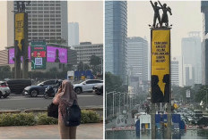 Berani Naik ke Puncak Patung Selamat Datang! Aktivis Greenpeace Bentangkan Spanduk Kritik Biaya Hidup